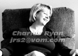 Cindy-in-armchair-laughing